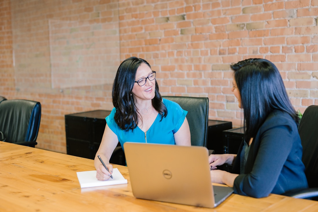 Consulting team discussing strategy with a client